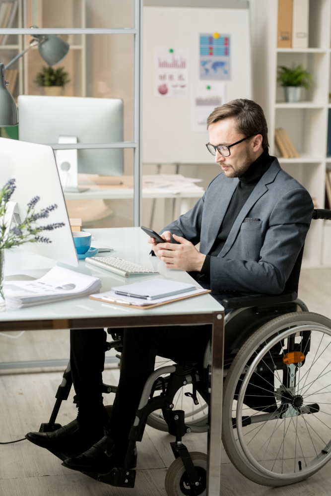 disabled-businessman-using-smartphone
